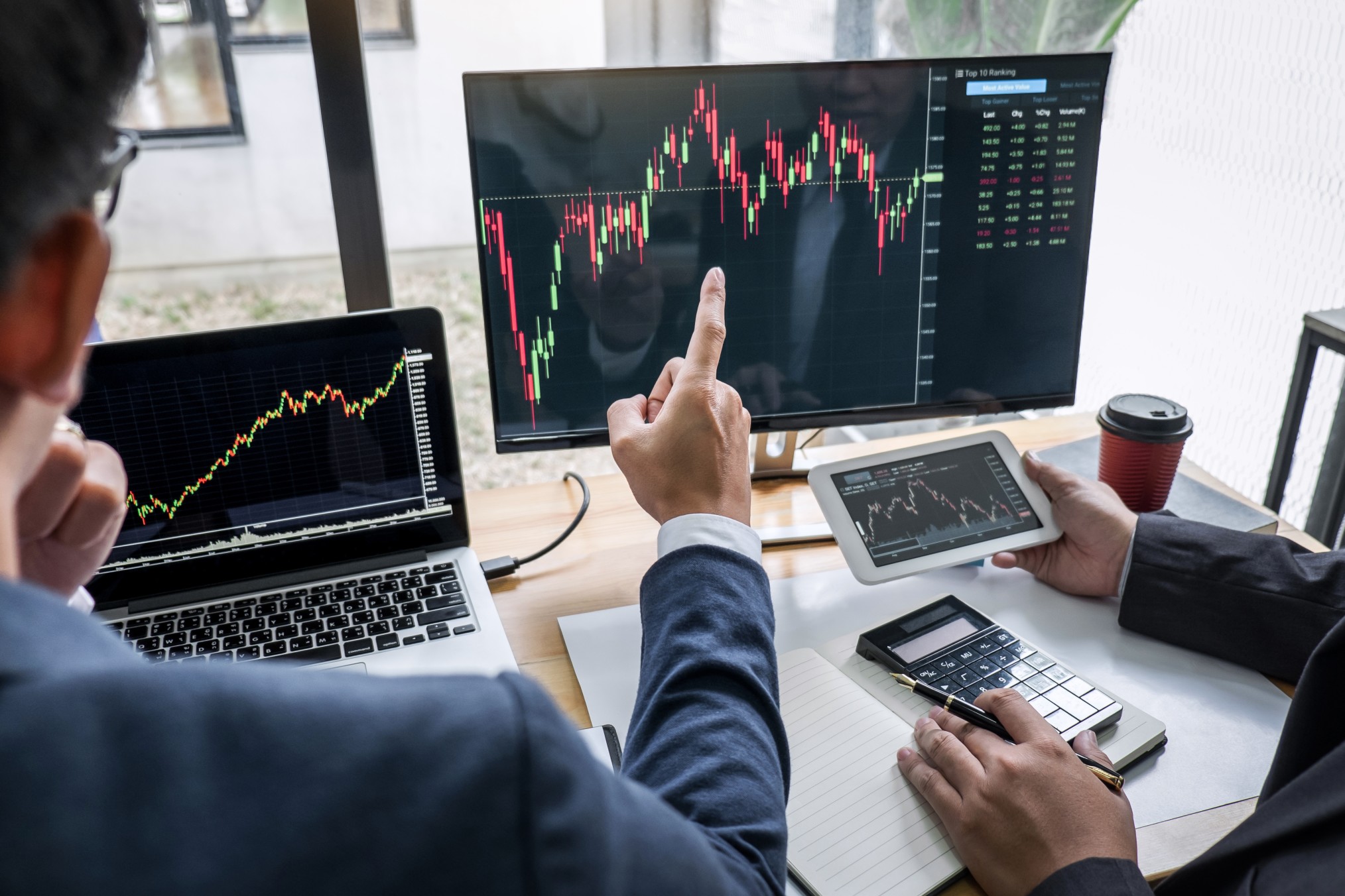 business-team-investment-working-with-computer-planning-and-analyzing-graph-stock-market-trading-with_t20_KvBbp9